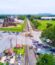 railway-near-historic-sites-with-parked-car-waiting-train-run-pass_40185-167